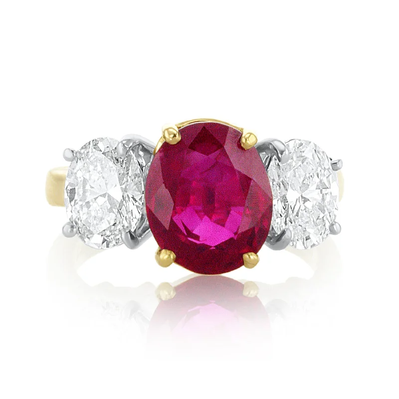 ladies custom rings-4.00 Carat Heated Ruby and 1.80 Carat Diamond Three-Stone Oval Ring set in Platinum and Gold