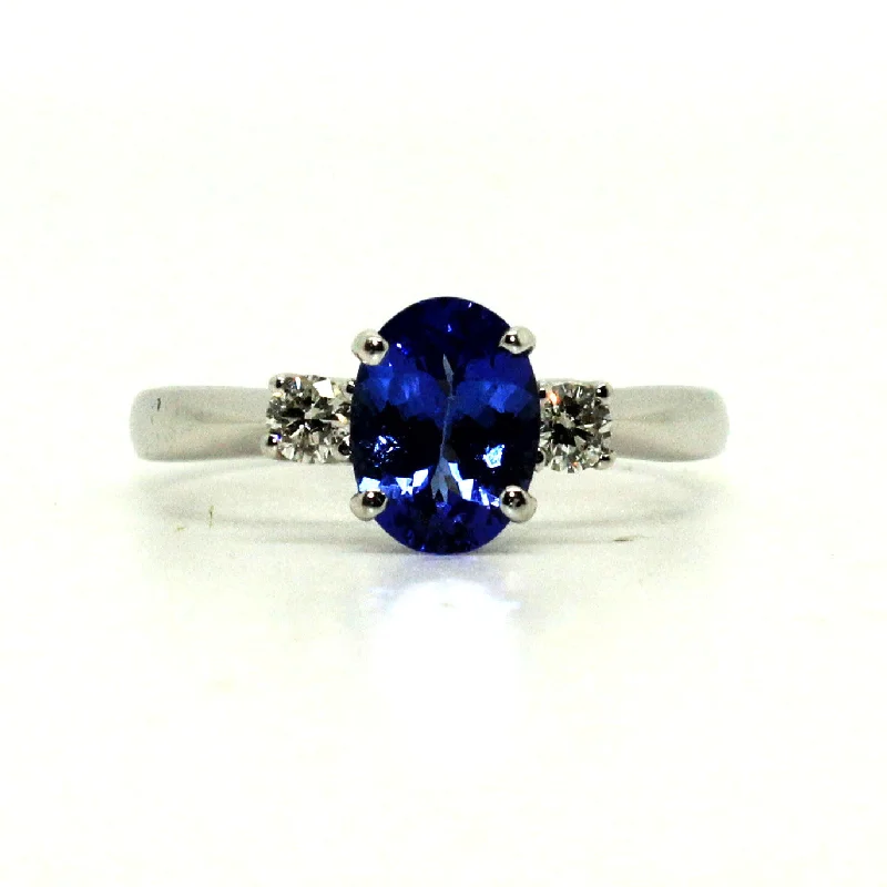 ladies unique rings-Tanzanite And Diamond Classic 3 Stone Ring Ad No. 0295