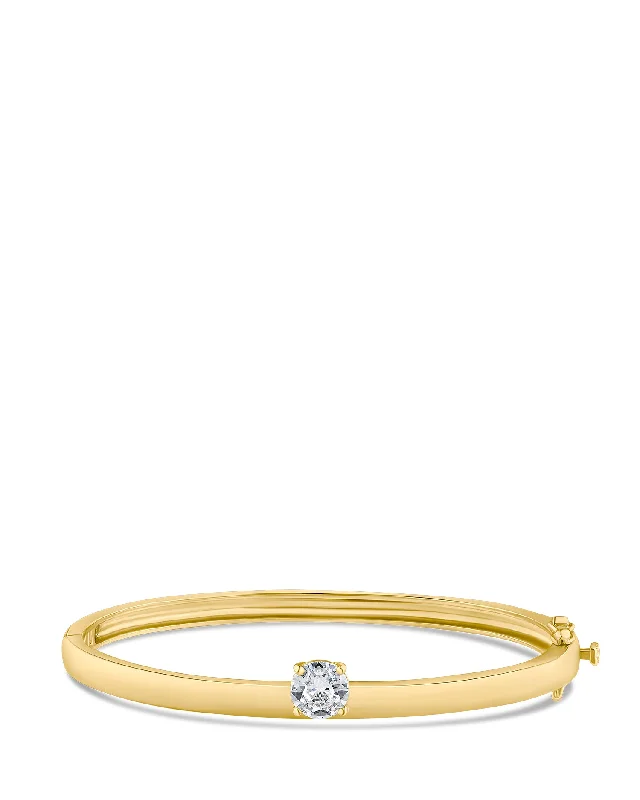 ladies gold bracelets-Round CZ Asymmetrical Bracelet