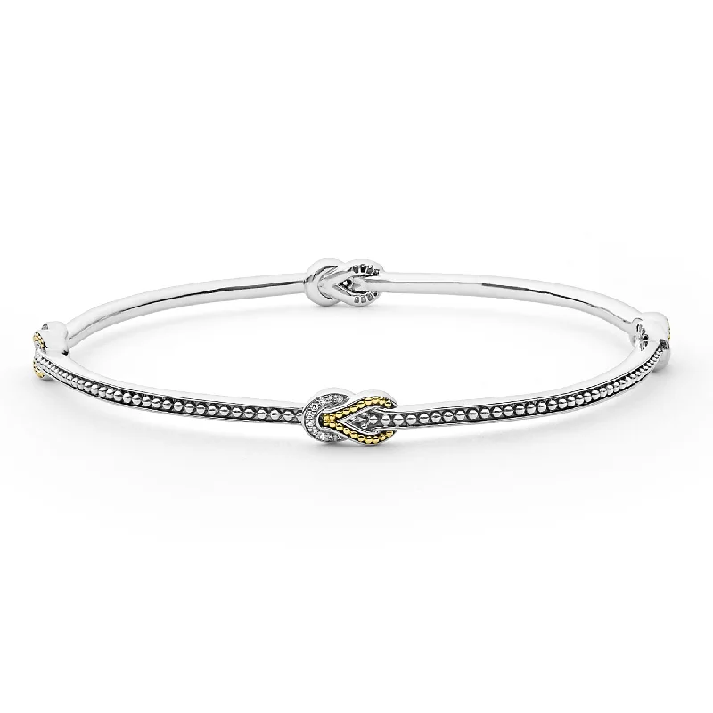 ladies silver bangles-Newport Four Station Two-Tone Knot Diamond Bangle Bracelet