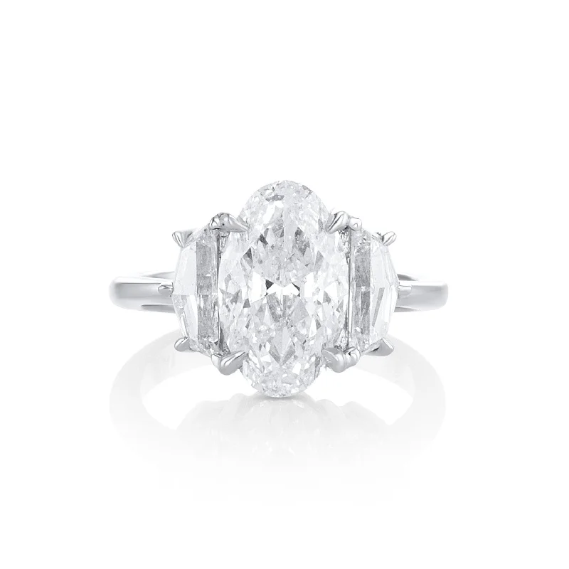 ladies platinum rings-3.00 Carat Oval Diamond and Cadillac Three-Stone Ring GIA Certified set in Platinum